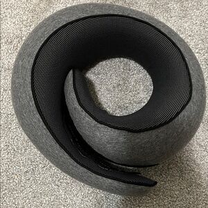 Gray travel pillow. Washable cover and memory foam.